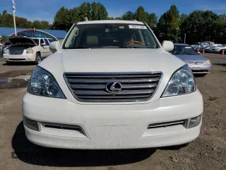 2004 Lexus GX 470 with VIN JTJBT20XX40033938, listed as a Copart auction lot 70871164 with 214,565 mi miles and Salvage Title. Bid and sale history available at carsss.com. Image 5.