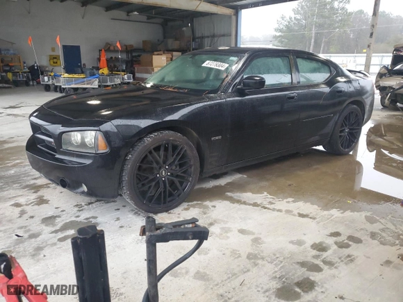 2010 Dodge Charger R/T with VIN 2B3CA5CT9AH156470, listed as a Copart auction lot 87279304 with 206,789 mi miles and Salvage Title. Bid and sale history available at carsss.com. Image 1.