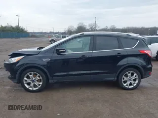2016 Ford Escape Titanium with VIN 1FMCU0J91GUC69895, listed as a IAAI auction lot 41488171 with 162,232 mi miles. Bid and sale history available at carsss.com. Image 15.