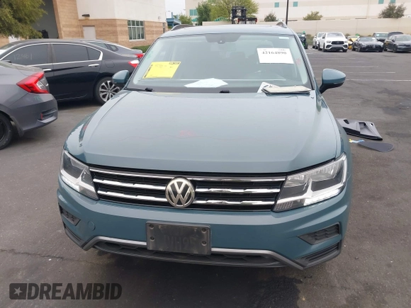 2019 Volkswagen Tiguan SE with VIN 3VV3B7AX3KM113955, listed as a IAAI auction lot 42164890 with 77,806 mi miles and . Bid and sale history available at DreamBid. Image 13.