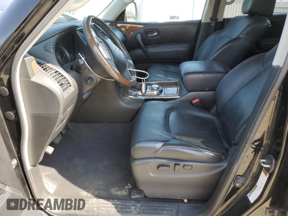 2016 Infiniti QX80 with VIN JN8AZ2NEXG9125401, listed as a Copart auction lot 65924664 with 138,858 mi miles and Salvage Title. Bid and sale history available at carsss.com. Image 7.