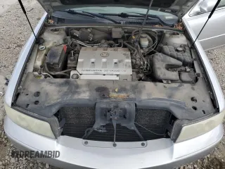 2003 Cadillac Seville Luxury SLS z VIN 1G6KS54Y53U262581, wystawiony jako Copart lot #55597595 z przebiegiem 80 832 mil mil oraz Szkoda całkowita • Salvage title. Historia ofert i sprzedaży dostępna na DreamBid. Obrazek 11.