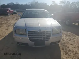 2009 Chrysler 300 z VIN 2C3KK53V09H568544, wystawiony jako Copart lot #47015735 z przebiegiem 126 245 mil mil oraz Szkoda całkowita • Salvage title. Historia ofert i sprzedaży dostępna na DreamBid. Obrazek 5.