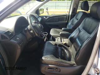 2006 Honda Odyssey Touring z VIN 5FNRL388X6B009356, wystawiony jako Copart lot #55991335 z przebiegiem 101 816 mil mil oraz Szkoda całkowita • Salvage title. Historia ofert i sprzedaży dostępna na DreamBid. Obrazek 7.