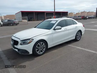 2018 Mercedes-Benz C 300 with VIN 55SWF4JB2JU258957, listed as a IAAI auction lot 42058233 with 61,788 mi miles and . Bid and sale history available at DreamBid. Image 2.