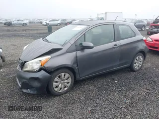 2013 Toyota Yaris L with VIN JTDJTUD39DD560766, listed as a IAAI auction lot 41031127 with 57,831 mi miles. Bid and sale history available at carsss.com. Image 2.