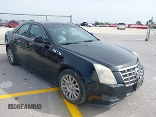 2013 Cadillac CTS Luxury with VIN 1G6DE5E50D0101763, listed as a IAAI auction lot 42090577 with 105,097 mi miles and . Bid and sale history available at DreamBid. Image 1.