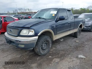 2000 Ford F-150 XL with VIN 1FTRX18L1YNA08999, listed as a IAAI auction lot 41988747 with 214,201 mi miles. Bid and sale history available at carsss.com. Image 2.