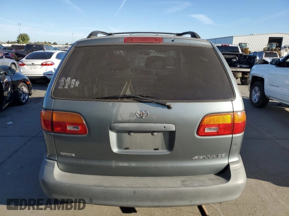 1999 Toyota Sienna CE with VIN 4T3ZF19C2XU100132, listed as a Copart auction lot 75251124 with 217,399 mi miles and Salvage Title. Bid and sale history available at carsss.com. Image 6.