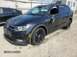 2021 Volkswagen Tiguan SE z VIN 3VV3B7AXXMM069410, wystawiony jako Copart lot #58994325 z przebiegiem 55 846 mil mil oraz Szkoda całkowita • Salvage title. Historia ofert i sprzedaży dostępna na DreamBid. Obrazek 1.