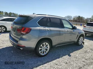 2014 BMW X5 xDrive50i with VIN 5UXKR6C54E0C03037, listed as a Copart auction lot 50040245 with 67,377 mi miles and Clean Title. Bid and sale history available at carsss.com. Image 3.