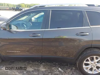 2014 Jeep Cherokee Latitude with VIN 1C4PJLCB6EW241897, listed as a IAAI auction lot 42128880 with 126,242 mi miles. Bid and sale history available at carsss.com. Image 14.