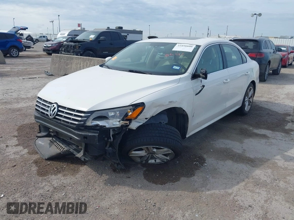 2014 Volkswagen Passat SE z VIN 1VWBN7A32EC003724, wystawiony jako IAAI lot #41890800 z przebiegiem 117 070 mil mil oraz . Historia ofert i sprzedaży dostępna na DreamBid. Obrazek 6.