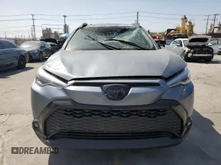 2024 Toyota Corolla Cross Hybrid S with VIN 7MUFBABG7RV043044, listed as a Copart auction lot 61828715 with 10,473 mi miles and Salvage title. Bid and sale history available at DreamBid. Image 5.
