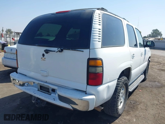 2004 Chevrolet Tahoe LS with VIN 1GNEC13T44R321833, listed as a IAAI auction lot 40559396 with 170,652 mi miles and . Bid and sale history available at DreamBid. Image 4.