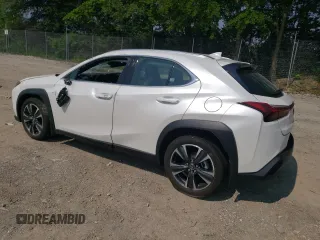 2025 Lexus UX 300h with VIN JTHUCJDH3S2000210, listed as a Copart auction lot 60677575 with 18,329 mi miles and Salvage title. Bid and sale history available at DreamBid. Image 2.