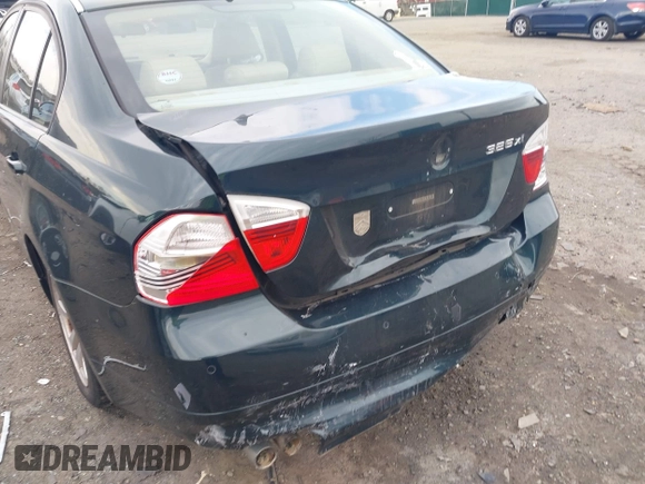 2006 BMW 3 Series 325xi with VIN WBAVD13516KT79513, listed as a IAAI auction lot 41609704 with 116,883 mi miles. Bid and sale history available at carsss.com. Image 6.