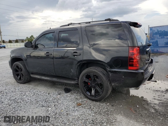 2010 Chevrolet Tahoe LTZ with VIN 1GNUKCE01AR127365, listed as a Copart auction lot 60711715 with 151,962 mi miles and Salvage title. Bid and sale history available at DreamBid. Image 2.