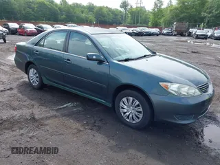 2006 Toyota Camry STD with VIN 4T1BE32K06U114202, listed as a IAAI auction lot 42384135 with 233,604 mi miles and . Bid and sale history available at DreamBid. Image 1.
