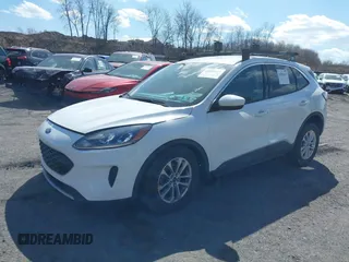 2020 Ford Escape SE with VIN 1FMCU9G61LUB80243, listed as a IAAI auction lot 41842611 with 76,801 mi miles. Bid and sale history available at carsss.com. Image 2.