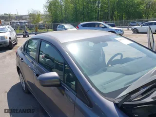 2015 Honda Civic Sedan LX with VIN 19XFB2F50FE095498, listed as a IAAI auction lot 42077072 with 211,682 mi miles. Bid and sale history available at carsss.com. Image 17.