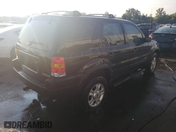 2001 Ford Escape XLT with VIN 1FMCU04141KB40767, listed as a Copart auction lot 71492664 with 118,541 mi miles and Salvage Title. Bid and sale history available at DreamBid. Image 3.