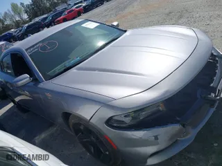 2018 Dodge Charger R/T with VIN 2C3CDXCT8JH150312, listed as a IAAI auction lot 41781940 with 76,724 mi miles. Bid and sale history available at carsss.com. Image 1.