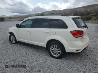 2013 Dodge Journey SXT with VIN 3C4PDDBG1DT619798, listed as a Copart auction lot 51820685 with 209,404 mi miles and Salvage Title. Bid and sale history available at DreamBid. Image 2.
