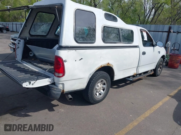 2003 Ford F-150 XL z VIN 2FTPF17Z73CA71197, wystawiony jako IAAI lot #42121486 z przebiegiem 236 800 mil mil oraz . Historia ofert i sprzedaży dostępna na DreamBid. Obrazek 4.