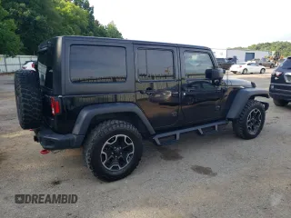 2016 Jeep Wrangler Unlimited Rubicon with VIN 1C4HJWFG9GL220687, listed as a Copart auction lot 60552705 with 49,525 mi miles and Salvage title. Bid and sale history available at DreamBid. Image 3.