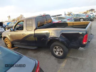 1999 Ford F-150 XL with VIN 1FTRX17L3XKB32547, listed as a IAAI auction lot 41331882 with Not Provided miles. Bid and sale history available at carsss.com. Image 14.