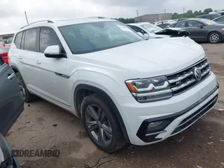 2019 Volkswagen Atlas SE z VIN 1V2XR2CA1KC512967, wystawiony jako IAAI lot #42108028 z przebiegiem 103 786 mil mil oraz . Historia ofert i sprzedaży dostępna na DreamBid. Obrazek 1.