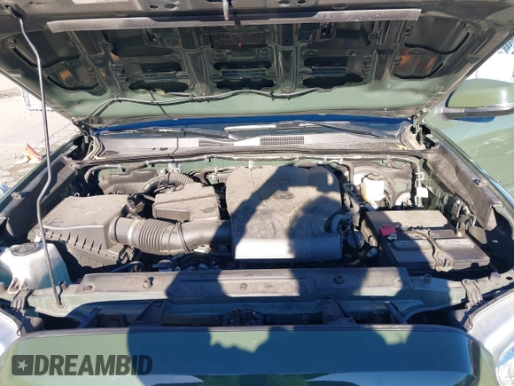 2021 Toyota Tacoma SR with VIN 3TMCZ5AN7MM395940, listed as a IAAI auction lot 41240832 with 39,338 mi miles and . Bid and sale history available at DreamBid. Image 10.