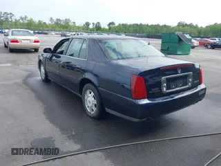 2003 Cadillac DeVille with VIN 1G6KD54Y53U232586, listed as a IAAI auction lot 42071165 with 174,403 mi miles. Bid and sale history available at carsss.com. Image 3.