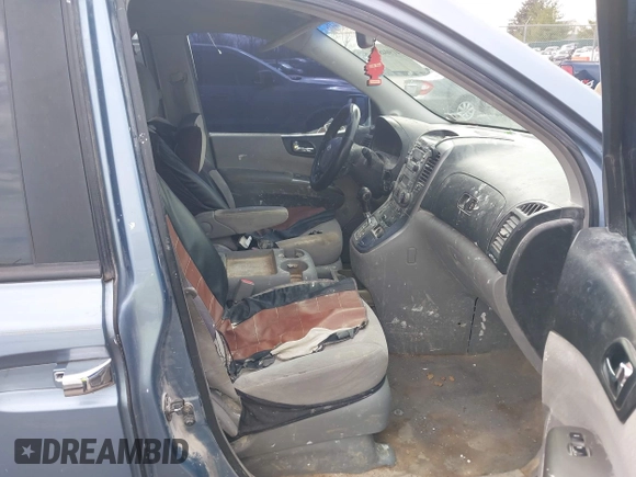2007 Hyundai Entourage GLS with VIN KNDMC233676035708, listed as a IAAI auction lot 41904895 with 253,017 mi miles and . Bid and sale history available at DreamBid. Image 5.