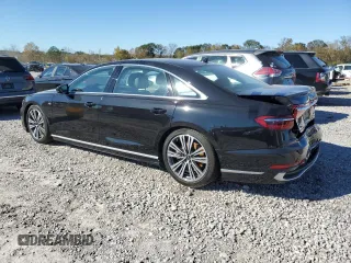 2023 Audi A8 with VIN WAULDAF83PN011055, listed as a Copart auction lot 80932444 with 9,734 mi miles and Salvage Title. Bid and sale history available at carsss.com. Image 2.