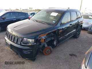 2017 Jeep Grand Cherokee Altitude with VIN 1C4RJEAG3HC854343, listed as a IAAI auction lot 42519303 with 136,721 mi miles and . Bid and sale history available at DreamBid. Image 18.