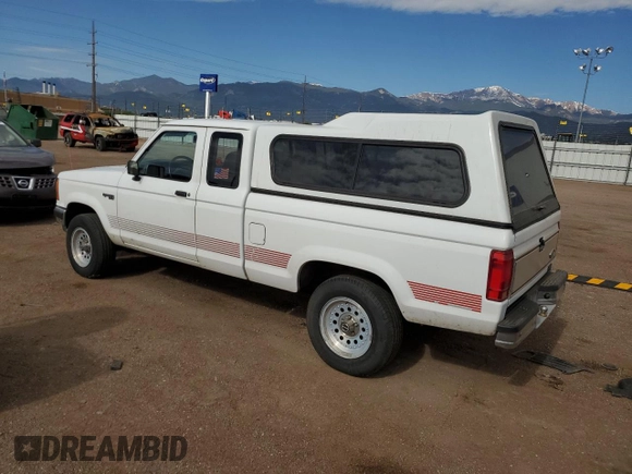 1992 Ford Ranger XLT with VIN 1FTCR15X9NPA98555, listed as a Copart auction lot 57470934 with 104,247 mi miles and Clean Title. Bid and sale history available at DreamBid. Image 2.