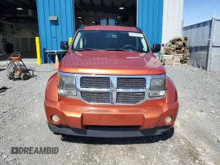 2007 Dodge Nitro SLT z VIN 1D8GU58K07W723331, wystawiony jako Copart lot #55169295 z przebiegiem 242 670 mil mil oraz Czysty tytuł • Clean title. Historia ofert i sprzedaży dostępna na DreamBid. Obrazek 5.