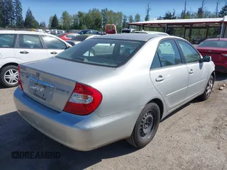 2004 Toyota Camry LE with VIN 4T1BE32K74U350908, listed as a IAAI auction lot 42099989 with 120,971 mi miles. Bid and sale history available at carsss.com. Image 4.