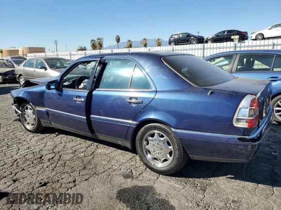 1996 Mercedes-Benz C with VIN WDBHA28E5TF406948, listed as a Copart auction lot 80234944 with 239,256 mi miles and Salvage Title. Bid and sale history available at carsss.com. Image 2.