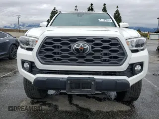 2021 Toyota Tacoma 4WD SR5 with VIN 3TMDZ5BN0MM114807, listed as a Copart auction lot 47781815 with 16,976 mi miles and Salvage Title. Bid and sale history available at carsss.com. Image 5.