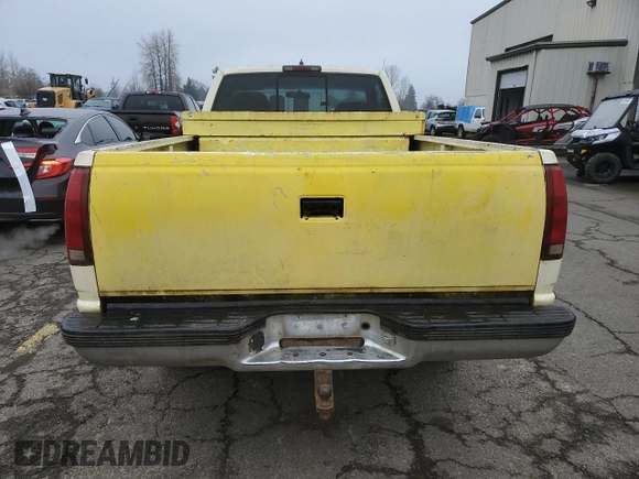 1997 GMC Sierra 1500 with VIN 1GTGC24R4VZ546832, listed as a Copart auction lot 87954535 with 411,941 mi miles and Clean Title. Bid and sale history available at DreamBid. Image 6.
