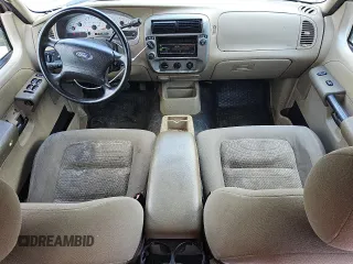 2004 Ford Explorer Sport Trac XLS z VIN 1FMZU77K64UA90633, wystawiony jako Copart lot #54862215 z przebiegiem 274 354 mil mil oraz Czysty tytuł • Clean title. Historia ofert i sprzedaży dostępna na DreamBid. Obrazek 8.