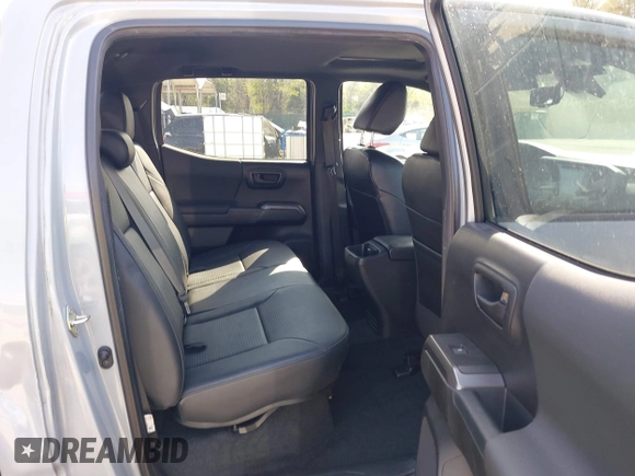 2018 Toyota Tacoma SR with VIN 3TMCZ5AN6JM170128, listed as a IAAI auction lot 42038979 with 59,497 mi miles. Bid and sale history available at carsss.com. Image 8.