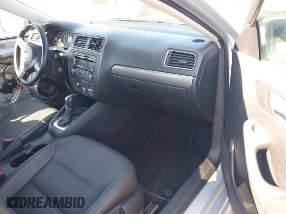 2013 Volkswagen Jetta TDI w/Premium with VIN 3VWLL7AJ0DM385077, listed as a IAAI auction lot 42322406 with 63,428 mi miles and . Bid and sale history available at DreamBid. Image 5.