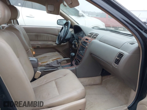 1998 Nissan Maxima GXE with VIN JN1CA21D4WT605270, listed as a IAAI auction lot 41505206 with 114,425 mi miles and . Bid and sale history available at DreamBid. Image 5.