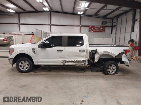 2021 Ford F-150 XL with VIN 1FTEW1C57MFA71572, listed as a IAAI auction lot 41549588 with 82,389 mi miles and . Bid and sale history available at carsss.com. Image 15.