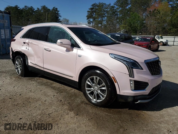 2023 Cadillac XT5 FWD Premium Luxury with VIN 1GYKNCR44PZ159363, listed as a Copart auction lot 49511915 with 42,382 mi miles and Salvage Title. Bid and sale history available at carsss.com. Image 4.