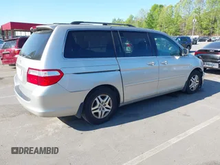 2006 Honda Odyssey EX-L with VIN 5FNRL38736B016026, listed as a IAAI auction lot 41971496 with 302,046 mi miles. Bid and sale history available at carsss.com. Image 4.